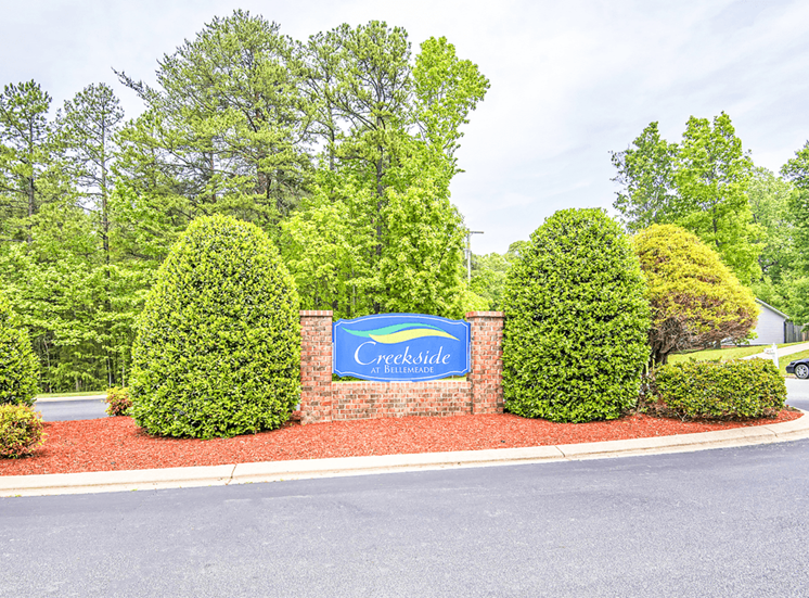 Community Entrance Sign with Shrubs